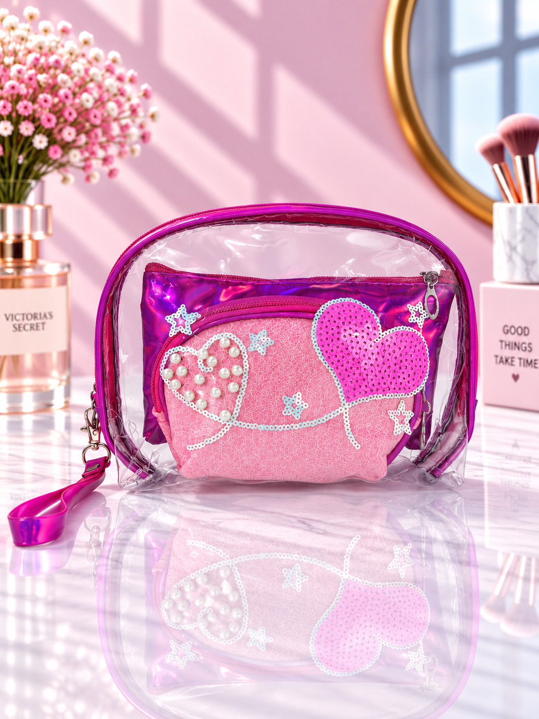 Purple transparent cosmetic organizer pouch with pink heart sequins and bead-like pearls